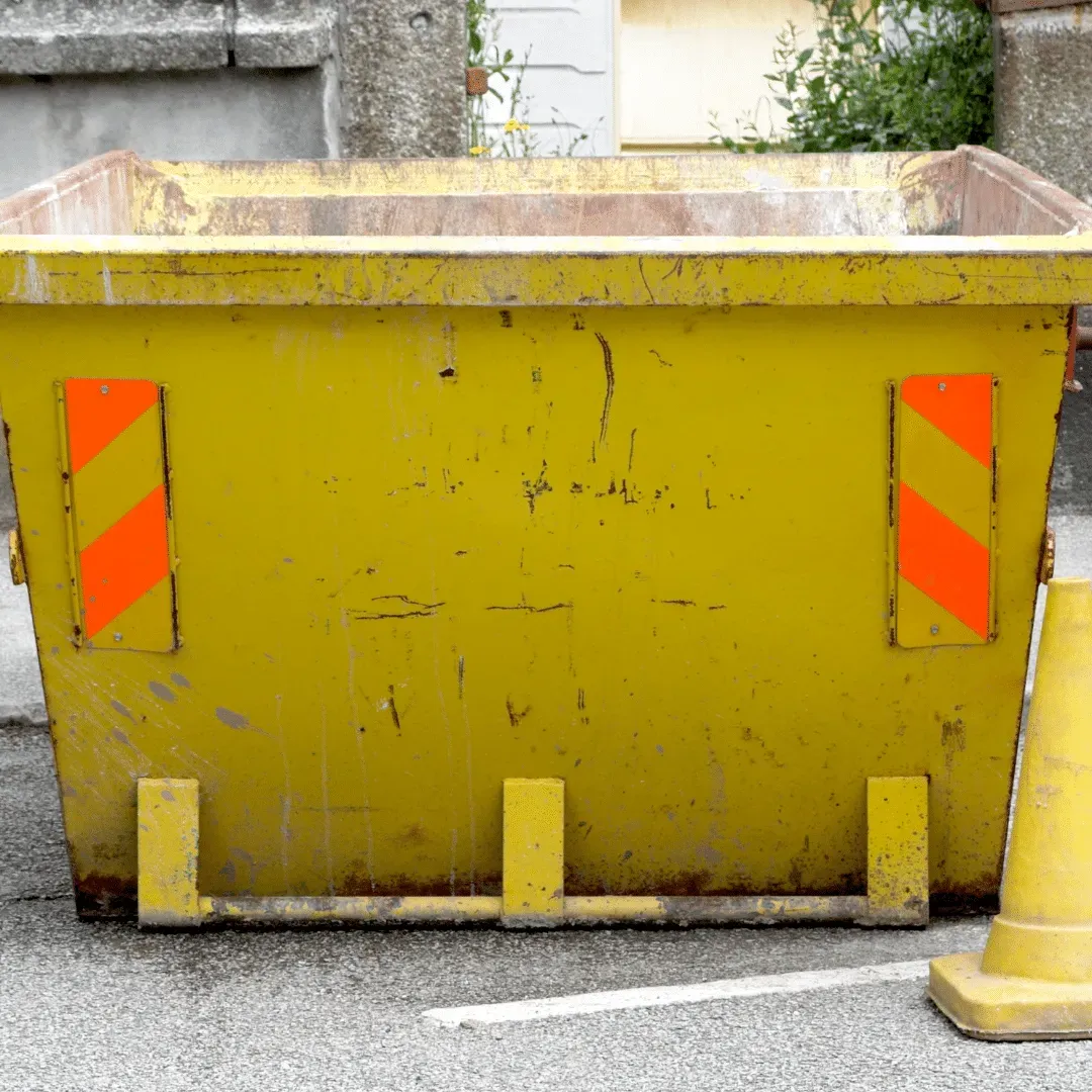 A yellow skip for asbestos waste disposal provided by Stay Safe Environmental.